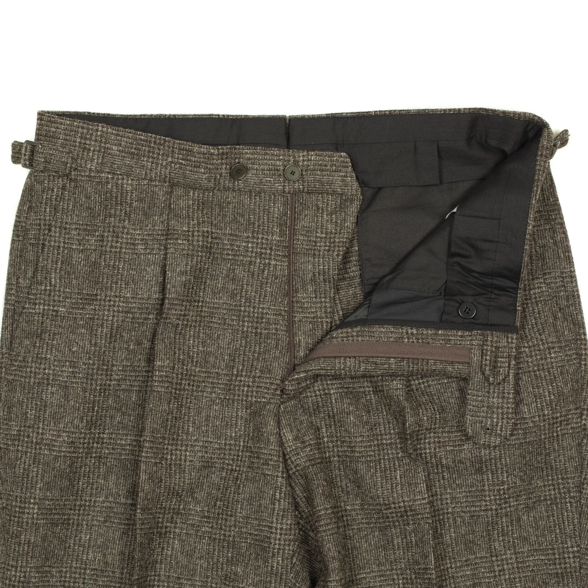 x Sartoria Carrara: Pleated trousers in tonal charcoal Prince-of-Wales undyed wool