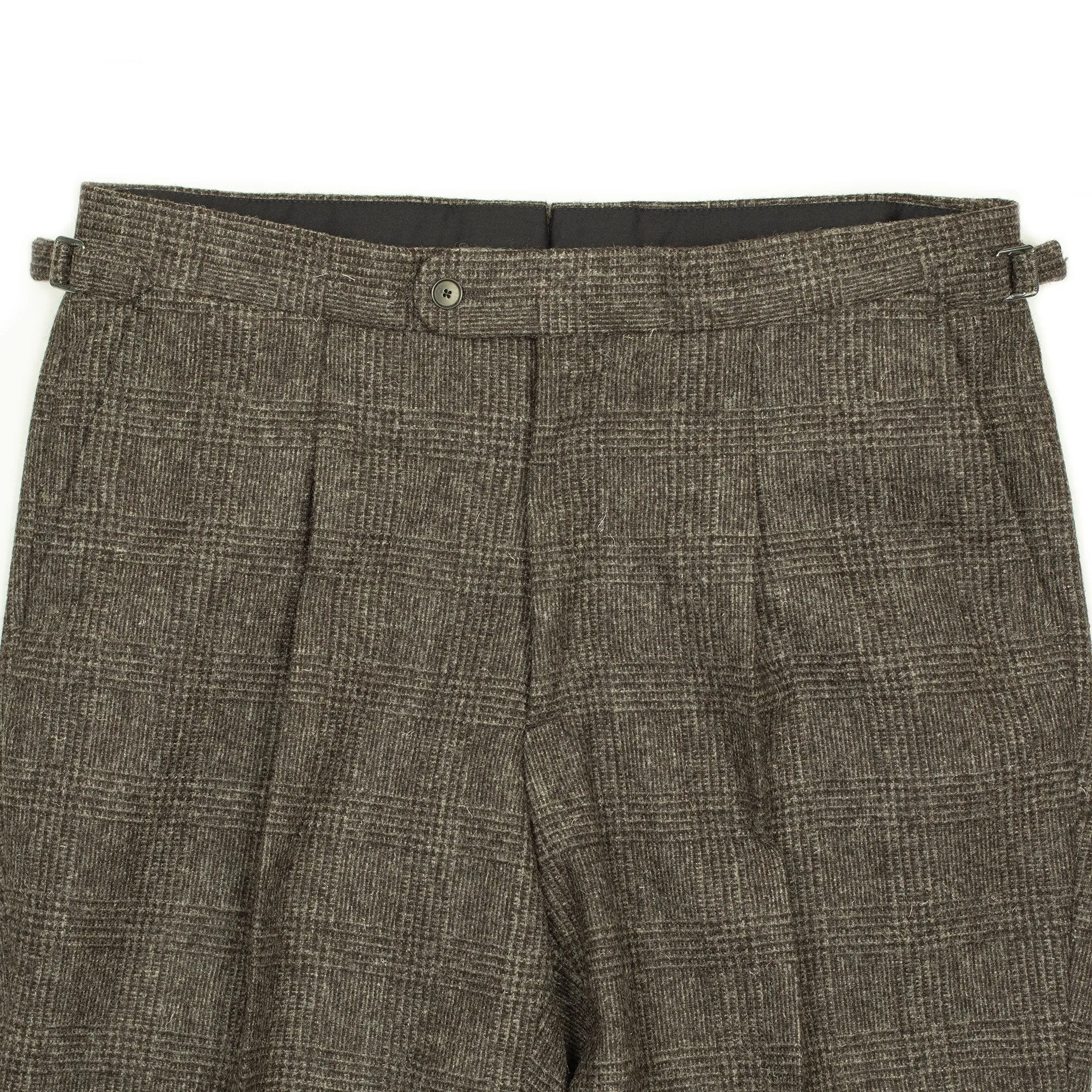 x Sartoria Carrara: Pleated trousers in tonal charcoal Prince-of-Wales undyed wool